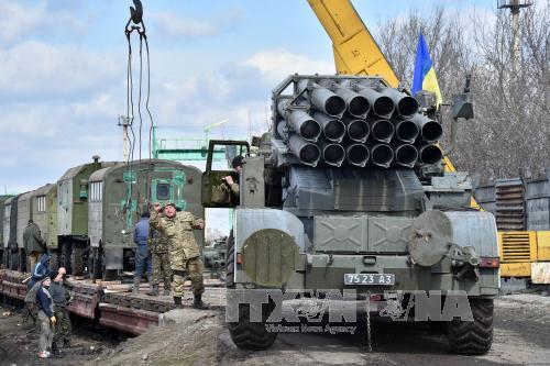 Các bên Ukraine đã rút phần lớn vũ khí hạng nặng